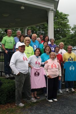 Still Running...
They keep you running. The Mattapoisett Road Race Committee, pictured here in their committee t-shirts, has been hard at work over the past year to bring a celebration worthy of the 40-year benchmark. Thats right  the Mattapoisett Road Race has been a part of your Fourth of July celebrations for 40 years! And with all that running, a lot of Old Rochester Regional students have benefitted from the scholarship money that the race raises. Heres to another 40 years. Photo by Anne OBrien-Kakley.July 1, 2010
