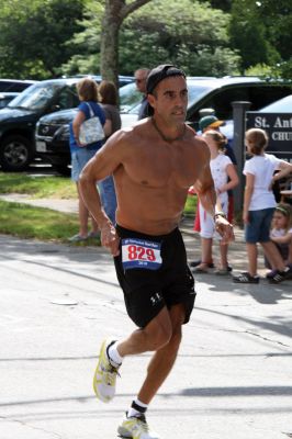 2010 Road Race
Mattapoisetts 40th Road Race took place on the steamy Saturday morning of July 3, 2010. Over a thousand runners registered for the highly anticipated annual five-mile event. Photo by Anne OBrien-Kakley.
