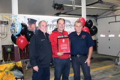 Rochester EMT
After 28 years, Rochester EMT Jim Holden is retiring, and on Tuesday, the Rochester Fire Department honored him with a cookout, a cake and a plaque commemorating his lengthy service to the town. Photos by Mick Colageo
