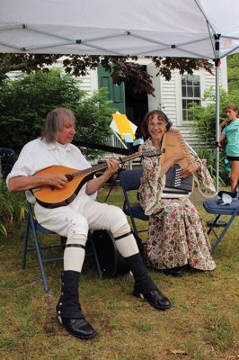 Rochester Historical Society
Malcolm Phinney, his wife Kathy and Claire Smith and her husband Howard “Howie” wore period costumes and shared oral histories of early American life during the Rochester Historical Society’s Fun Fair with A Flair held on June 22. Children learned how to load a musket, Boy Scouts Troop 31 demonstrated archery skills, visitors enjoyed live music and baked goods and those who ducked inside the 1857 East Rochester Church were treated to an amazing display of artifacts. Photos by Mick Colageo and courtesy Troop

