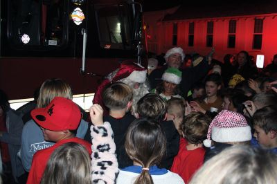 Rochester Christmas Tree
The town enjoyed a beautiful Monday evening and a large turnout, as children gathered on the steps of Town Hall to sing carols, and Santa Claus arrived with a Fire Department escort to hand out candy canes. Photos by Mick Colageo
