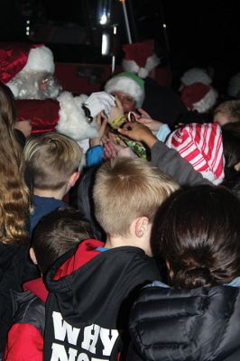 Rochester Christmas Tree
The town enjoyed a beautiful Monday evening and a large turnout, as children gathered on the steps of Town Hall to sing carols, and Santa Claus arrived with a Fire Department escort to hand out candy canes. Photos by Mick Colageo
