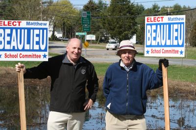 Election Time
Supporters of School Committee challenger Matthew Beaulieu stand at the entrance of Dexter Lane as residents drive in to cast their vote in the April 14, 2010 annual Rochester town election. Photo by Anne O'Brien-Kakley.
