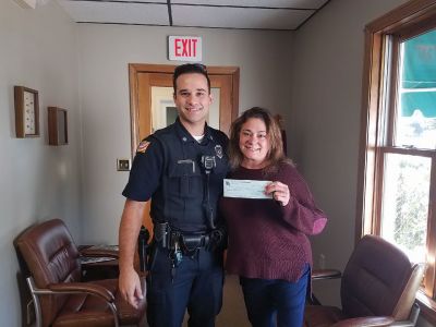 Rochester Police Brotherhood
The Rochester Police Brotherhood made a cash contribution to the upcoming Halloween party at Plumb Corner Mall. Photo courtesy Rachael Stanton
