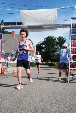 Rochester Road Race 
The Rochester Road Race saw 348 runners finish on August 13, 2011. Although there were 20 fewer runners from last year, the event still managed to raise 453 pounds of food for Damien's Pantry in Wareham. The men's winner was Julien De Marian of Paris, France, with a time of 15:57, and the women's winner was Jennifer Almeida of Acushnet with a time of 20:19. 
