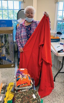 Craft Supply Sale
Celia Hall getting things ready for the Craft Supply Sale this Saturday from 9-2 at the Rochester Senior Center parking lot. Photo by Connie Dolan
