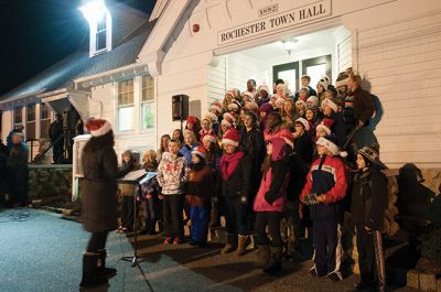 Tree Lighting 2014
Santa Claus arrived like a celebrity on December 8 at the annual Rochester Tree Lighting at Town Hall. Hundreds turned out to greet Santa, listen to the RMS chorus and band play Christmas carols, and watch as the flick of a switch lit up the tree, symbolizing the official start of Christmas in Rochester. Photos by Felix Perez
