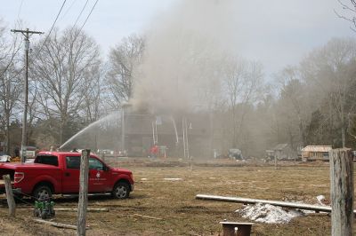 Rochester Fire
Just before 11:00 am on April 2, the Rochester Fire Department was called out to a structure fire on Vaughan Hill Road in Rochester, with initial responders calling for assistance from the Mattapoisett and Marion Fire Departments and a tanker from Rochester. The house was located on a farm about 1,000 feet from the road down a long dirt driveway, which created a problem for supplying water to the scene. 
