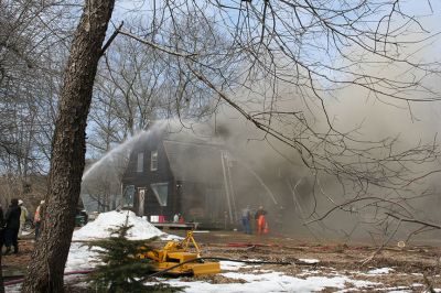 Rochester Fire
Just before 11:00 am on April 2, the Rochester Fire Department was called out to a structure fire on Vaughan Hill Road in Rochester, with initial responders calling for assistance from the Mattapoisett and Marion Fire Departments and a tanker from Rochester. The house was located on a farm about 1,000 feet from the road down a long dirt driveway, which created a problem for supplying water to the scene. 
