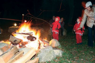 Moonlit Salty
Everyone had a blast at Saltys Moonlight Soiree at Dunseith Gardens on November 7, 2009. The Mattapoisett Land Trust provided sticks, marshmallows, chocolate, graham crackers, and entertainment. Children roasted their marshmallows while they enjoyed Big Ryan from Big Ryans Tall Tales. Photo by Anne OBrien-Kakley.
