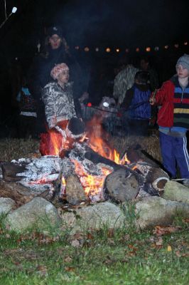 Moonlit Salty
Everyone had a blast at Saltys Moonlight Soiree at Dunseith Gardens on November 7, 2009. The Mattapoisett Land Trust provided sticks, marshmallows, chocolate, graham crackers, and entertainment. Children roasted their marshmallows while they enjoyed Big Ryan from Big Ryans Tall Tales. Photo by Anne OBrien-Kakley.
