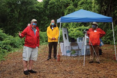 Osprey Marsh Accessible Boardwalk
Despite a downpour perfectly timed for its planned gathering on Friday off Point Road in Marion, the Sippican Lands Trust celebrated the completion of the new Osprey Marsh Accessible Boardwalk. Executive Director Jim Bride and president Alan Harris held a live Zoom meeting for those who could not attend, and some of the donors for the project assisted in the ribbon-cutting. The boardwalk is open by appointment. See story by Marilou Newell. Photo by Mick Colageo
