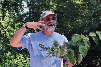  Sippican Lands Trust 
Russ Cohen, well-known and highly respected expert of wild edible plants, pointed out local vegetation along the trail at Brainard Marsh to a group during the Sippican Lands Trust and Marion Garden Group Edible Foraging Ramble on July 18. Photos by Marilou Newell
