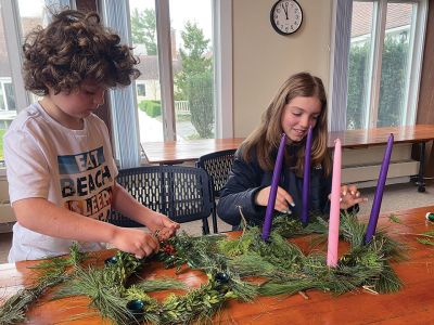 Saint Gabriel's Church
After Sunday's 10:00 am service at Saint Gabriel's Church in Marion, families and friends used the coffee hour to make Advent wreaths. Grandchildren, grandparents, couples and kids all had fun making their wreaths. An Advent wreath is a circle of greenery with four candles. The candles represent the four Sundays leading up to Christmas. As it was the first Sunday of Advent, so we lit the first candle. An additional candle is lit each successive Sunday to celebrate Advent. This is something that traditionall
