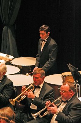 Tri-County Symphonic
Musical Director Phillip Sanborn and the Tri-County Symphonic Band performed a selection of dance related pieces during their Shall We Dance? concert performed at the Fireman Center on the campus of Tabor Academy on Sunday afternoon, March 22.  (Photo by Robert Chiarito)
