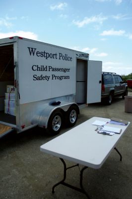 Safety Days
The Marion Police Brotherhood hosted their first annual Public Safety Day at Marion's Silvershell Beach on Saturday, June 13. The event included the installation of child safety seats in residents' vehicles, fingerprint and photo id cards for children along with displays from a variety of local, state and federal government public safety agencies. Photo by Robert Chiarito.
