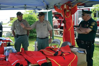 Safety Days
The Marion Police Brotherhood hosted their first annual Public Safety Day at Marion's Silvershell Beach on Saturday, June 13. The event included the installation of child safety seats in residents' vehicles, fingerprint and photo id cards for children along with displays from a variety of local, state and federal government public safety agencies. Photo by Robert Chiarito.
