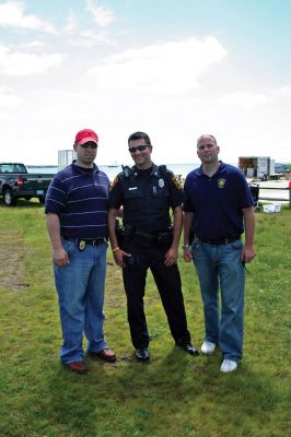 Safety Days
Marion police officers Sgt. Richard Nighelli, Anthony DiCarlo and Matt Cooper helped to organize this past weekend's Public Safety Day held at Marion's Silvershell Beach. The event included demonstrations by the Marion Police Dept., The Marion Fire Dept., Marion EMS, Marion Harbor Masters' Office, The Westport Police Dept., the Plymouth County Sherrifs' Dept., the U.S. Coast Guard as well as the Massachusetts State Police. Photo by Robert Chiarito.
