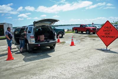 Safety Days
The Marion Police Brotherhood hosted their first annual Public Safety Day at Marion's Silvershell Beach on Saturday, June 13. The event included the installation of child safety seats in residents' vehicles, fingerprint and photo id cards for children along with displays from a variety of local, state and federal government public safety agencies. Photo by Robert Chiarito.
