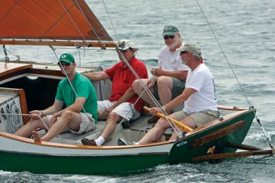 Builder's Cup
SWAN SONG, a Doughdish skippered by George Moffatt of Marion, and BUTTERFLY, a Stone Horse skippered by Vern Tisdale of Mattapoisett, and the crew aboard BUTTERFLY. Photo by Fran Grenon, www.spectrumphotofg.com
