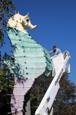 Salty the Sea Horse
Salty the Sea Horse's red underbelly was painted anew last week by Pete Davies (pictured), along with Matt Urquhart and Mike Huguenin, as the Mattapoisett Land Trust opened a season of anticipation of the MLT’s 50th anniversary next April. Photos by Mick Colageo and courtesy Mike Huguenin
