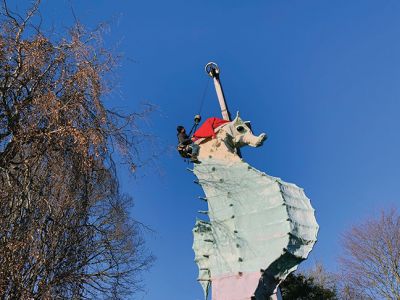 Salty's Hat
Mattapoisett’s most beloved seahorse got his Santa hat on Tuesday, December 4. The Mattapoisett Land Trust’s annual tradition continues with help from the folks at Brownell Systems and their trusty crane. This year Alan Johnson braved a fear of heights to place the hat on top of Salty the Seahorse’s head just right as MLT’s Jenny Mello directed from below and Brownell’s Tom Checkman operated the crane’s controls. Photos by Jean Perry
