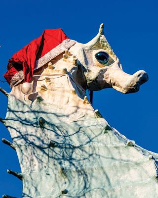 Salty's Hat
Due to a lift needing repair, Salty the Seahorse donned his Santa hat a day after the annual event was scheduled, but one of Mattapoisett’s signature landmarks wears it as proudly as ever on December 10. Originally constructed by gift shop owner Henry Dunseith in the pre-Route 195 mid-1950s when Route 6 was the main thoroughfare to Cape Cod, Salty’s future was as up in the air as his snout before a restoration project in 2000 ensured his long-term future. Photo by Ryan Feeney
