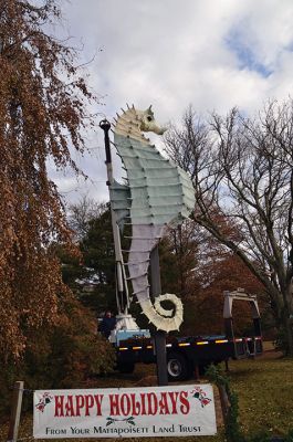 Salty's Hat
Early this past Friday, December 1, as folks were rushing to work and children settling into school, an annual tradition transpired in Mattapoisett at the corner of Route 6 and North Street. With the placement of the Santa hat upon the head of our beloved Salty the Seahorse, the holiday season officially began. As they do every year, the folks at Brownell Systems assisted the Mattapoisett Land Trust in the placement of the hat via a tall crane. Photo by Paul Lopes
