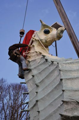 Salty's Hat
Early this past Friday, December 1, as folks were rushing to work and children settling into school, an annual tradition transpired in Mattapoisett at the corner of Route 6 and North Street. With the placement of the Santa hat upon the head of our beloved Salty the Seahorse, the holiday season officially began. As they do every year, the folks at Brownell Systems assisted the Mattapoisett Land Trust in the placement of the hat via a tall crane. Photo by Paul Lopes
