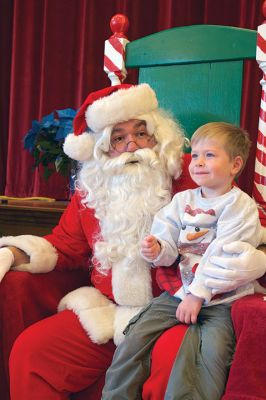 Pizza with Santa
The Marion Police Brotherhood held its 5th annual Pizza with Santa on Sunday, December 4, at the Marion Music Hall. Kids shared a pie with jolly old Saint Nick and later posed for pictures. Photos by Colin Veitch
