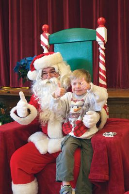 Pizza with Santa
The Marion Police Brotherhood held its 5th annual Pizza with Santa on Sunday, December 4, at the Marion Music Hall. Kids shared a pie with jolly old Saint Nick and later posed for pictures. Photos by Colin Veitch
