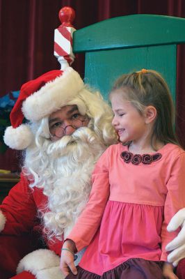 Pizza with Santa
The Marion Police Brotherhood held its 5th annual Pizza with Santa on Sunday, December 4, at the Marion Music Hall. Kids shared a pie with jolly old Saint Nick and later posed for pictures. Photos by Colin Veitch
