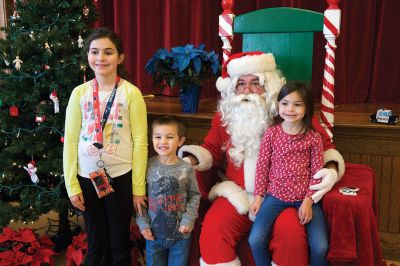 Pizza with Santa
The Marion Police Brotherhood held its 5th annual Pizza with Santa on Sunday, December 4, at the Marion Music Hall. Kids shared a pie with jolly old Saint Nick and later posed for pictures. Photos by Colin Veitch
