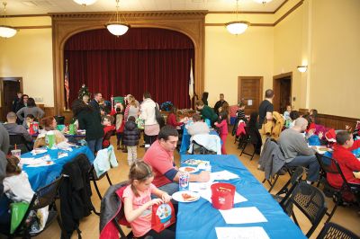 Pizza with Santa
The Marion Police Brotherhood held its 5th annual Pizza with Santa on Sunday, December 4, at the Marion Music Hall. Kids shared a pie with jolly old Saint Nick and later posed for pictures. Photos by Colin Veitch
