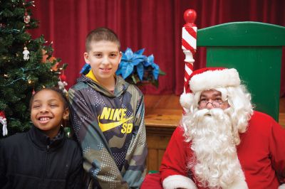 Pizza with Santa
The Marion Police Brotherhood held its 5th annual Pizza with Santa on Sunday, December 4, at the Marion Music Hall. Kids shared a pie with jolly old Saint Nick and later posed for pictures. Photos by Colin Veitch
