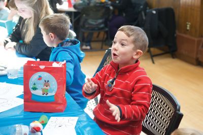 Pizza with Santa
The Marion Police Brotherhood held its 5th annual Pizza with Santa on Sunday, December 4, at the Marion Music Hall. Kids shared a pie with jolly old Saint Nick and later posed for pictures. Photos by Colin Veitch
