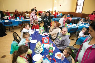 Pizza with Santa
The Marion Police Brotherhood held its 5th annual Pizza with Santa on Sunday, December 4, at the Marion Music Hall. Kids shared a pie with jolly old Saint Nick and later posed for pictures. Photos by Colin Veitch
