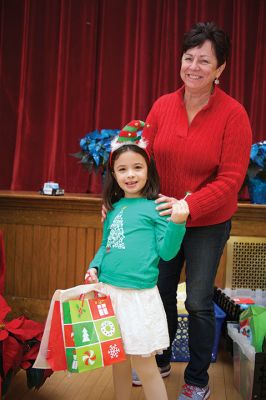 Pizza with Santa
The Marion Police Brotherhood held its 5th annual Pizza with Santa on Sunday, December 4, at the Marion Music Hall. Kids shared a pie with jolly old Saint Nick and later posed for pictures. Photos by Colin Veitch
