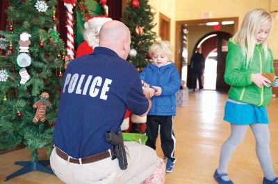 Pizza with Santa
The Marion Police Brotherhood held its annual “Pizza with Santa” on Sunday, December 6, keeping up the tradition of collecting toy donations for its “Stuff a Cruiser” toy drive to benefit those served by the Justice Resource Institute. Marion Police say this was the biggest year yet for toy donations. Photos by Colin Veitch
