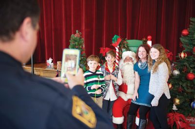 Pizza with Santa
The Marion Police Brotherhood held its annual “Pizza with Santa” on Sunday, December 6, keeping up the tradition of collecting toy donations for its “Stuff a Cruiser” toy drive to benefit those served by the Justice Resource Institute. Marion Police say this was the biggest year yet for toy donations. Photos by Colin Veitch
