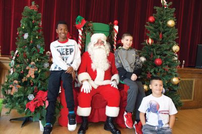 Pizza with Santa
The Marion Police Brotherhood held its annual “Pizza with Santa” on Sunday, December 6, keeping up the tradition of collecting toy donations for its “Stuff a Cruiser” toy drive to benefit those served by the Justice Resource Institute. Marion Police say this was the biggest year yet for toy donations. Photos by Colin Veitch
