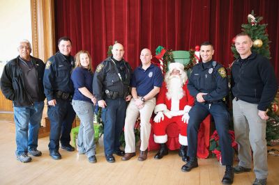 Pizza with Santa
The Marion Police Brotherhood held its annual “Pizza with Santa” on Sunday, December 6, keeping up the tradition of collecting toy donations for its “Stuff a Cruiser” toy drive to benefit those served by the Justice Resource Institute. Marion Police say this was the biggest year yet for toy donations. Photos by Colin Veitch
