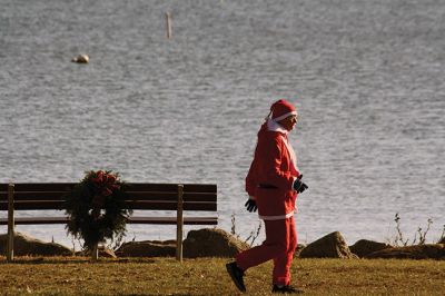 Santa Run 
Saturday, December 7, was the Santa Run 5k through the village of Mattapoisett. Usually held in New Bedford, race organizer Geoff Smith moved the race to Mattapoisett, flooding the village streets with hundreds of Santas – and a few Christmas miniature horses, as well. Photos by Jean Perry
