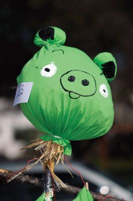 Scarecrow Fun
There was a green pig but no Angry Birds at the October 15, 2011 Mattapoisett library scarecrow contest. This scarecrow was made by the Dupre family. Photo by Felix Perez.
