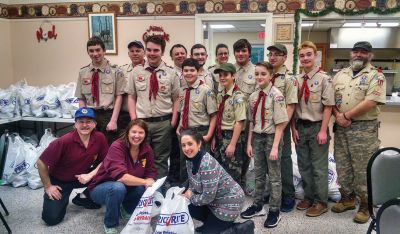 Rochester Boy Scout Troop 31
Rochester Boy Scout Troop 31 joined forces this past Sunday to help the Rochester Lions Club package Holiday Meals for local families in need at the Rochester Council on Aging. The Rochester Lions Club works hard each year through local fundraising efforts to provide annual services and holiday meals (at Thanksgiving and Christmas) to local families of Rochester and surrounding communities who are in need. Photo courtesy of Ilana Mackin
