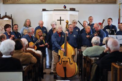 New Bedford Harbor Sea Chantey Chorus 
The New Bedford Harbor Sea Chantey Chorus visited the Mattapoisett Museum and Carriage House on April 21 to share songs that reflect the rich maritime heritage of the region. The chorus of more than 40 members boasts a repertoire including chanteys, ballads, and ditties of sailors, whalers, and coastwise fisherfolk. Photo by Felix Perez. 
