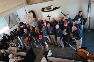 New Bedford Harbor Sea Chantey Chorus 
The New Bedford Harbor Sea Chantey Chorus visited the Mattapoisett Museum and Carriage House on April 21 to share songs that reflect the rich maritime heritage of the region. The chorus of more than 40 members boasts a repertoire including chanteys, ballads, and ditties of sailors, whalers, and coastwise fisherfolk. Photo by Felix Perez. 
