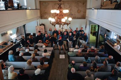 New Bedford Harbor Sea Chantey Chorus 
The New Bedford Harbor Sea Chantey Chorus visited the Mattapoisett Museum and Carriage House on April 21 to share songs that reflect the rich maritime heritage of the region. The chorus of more than 40 members boasts a repertoire including chanteys, ballads, and ditties of sailors, whalers, and coastwise fisherfolk. Photo by Felix Perez. 
