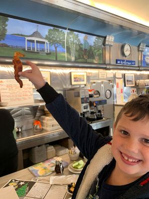 Appetizing Apparition
“Appetizing Apparition” – Six-year-old Nathan Grossman decided to behold his breakfast long enough to notice something different about this piece of bacon before taking a bite. “Hey, look! The bacon looks like the Seahorse!" Grossman shouted out, according to Liza Appleby of Mattapoisett who witnessed the excitement. “I surprisingly had to agree,” said Appleby. “It certainly did look like Salty the Mattapoisett Seahorse.” Photo courtesy Liza Appleby
