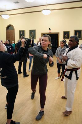 Marion Police Self Defense Class
On November 6 and 8, women ages 15 and up learned basic, self-defense strategies from Marion Police Officer Captain Carl MacDermott III at the Music Hall. Awareness of one’s surroundings was a prime message, and participants practiced moves under assault. The program gave women confidence to protect themselves. “We learned basic self-defense stances and how to protect the face … the second night built on first-session skills,” said Cindy Macallister of Mattapoisett
